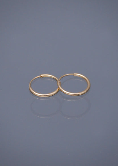 Candongas lisas 0.4gr / Largo 1cm / Oro Amarillo Nac B