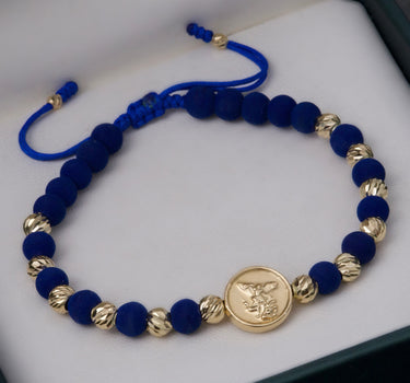 Pulsera en hilo azul con herraje san miguel 2.4gr / Oro Amarillo (Joya)*