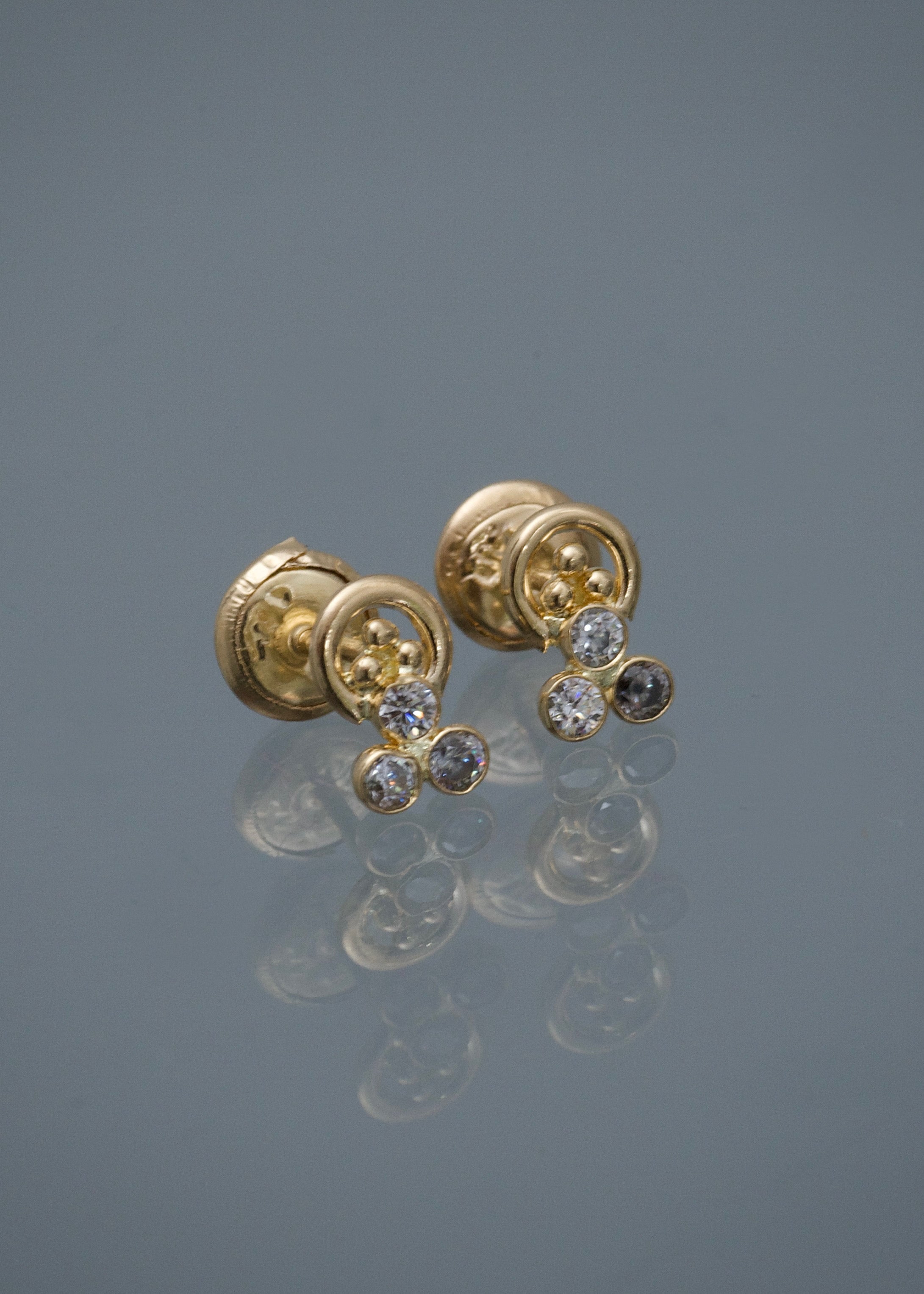 Topos con swarovski blanco 0.8gr / Largo 0.8cm / Oro Amarillo Nac B