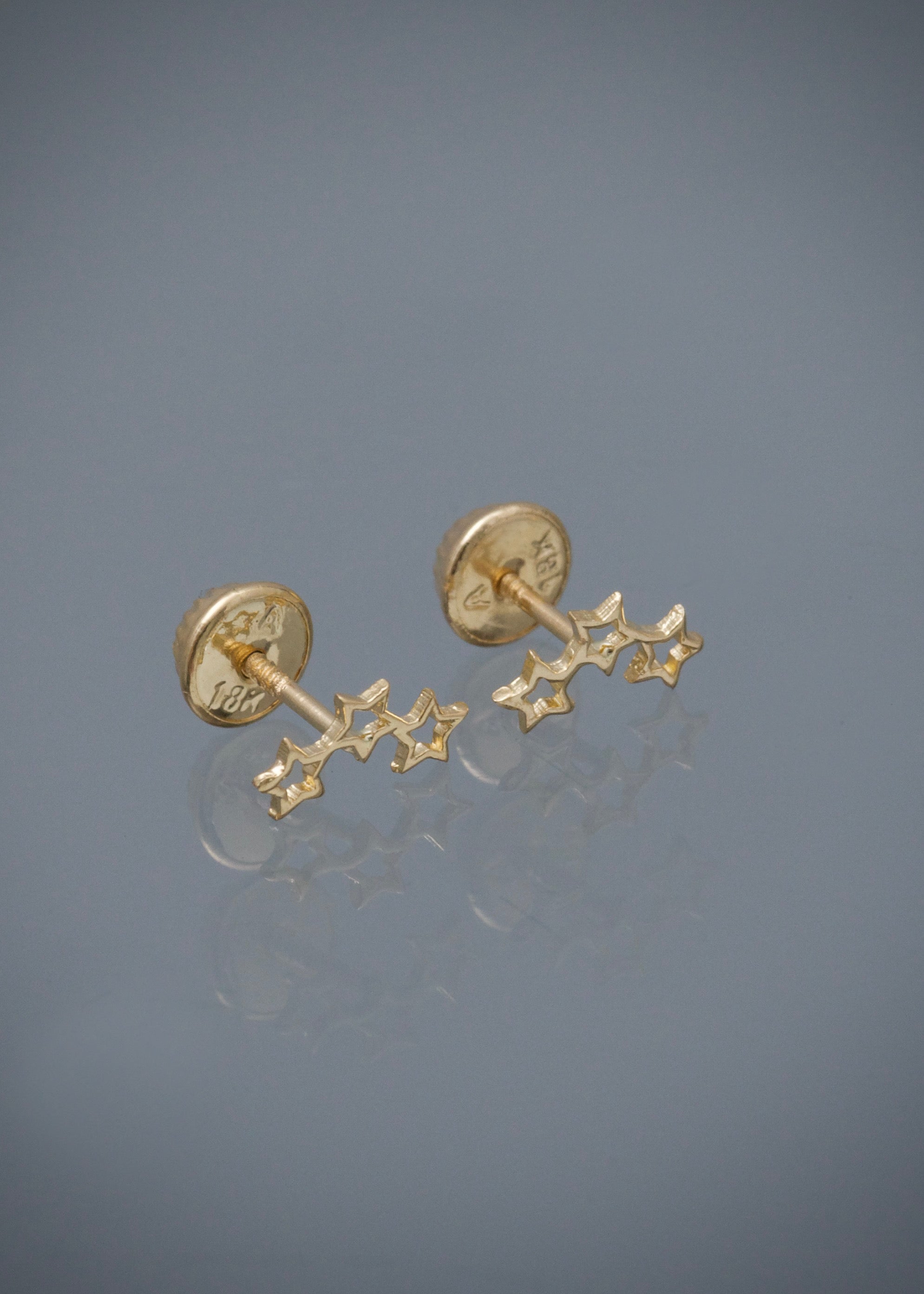 Topos estrellas 0.55gr / Largo 0.8cm / Oro Amarillo Nac M