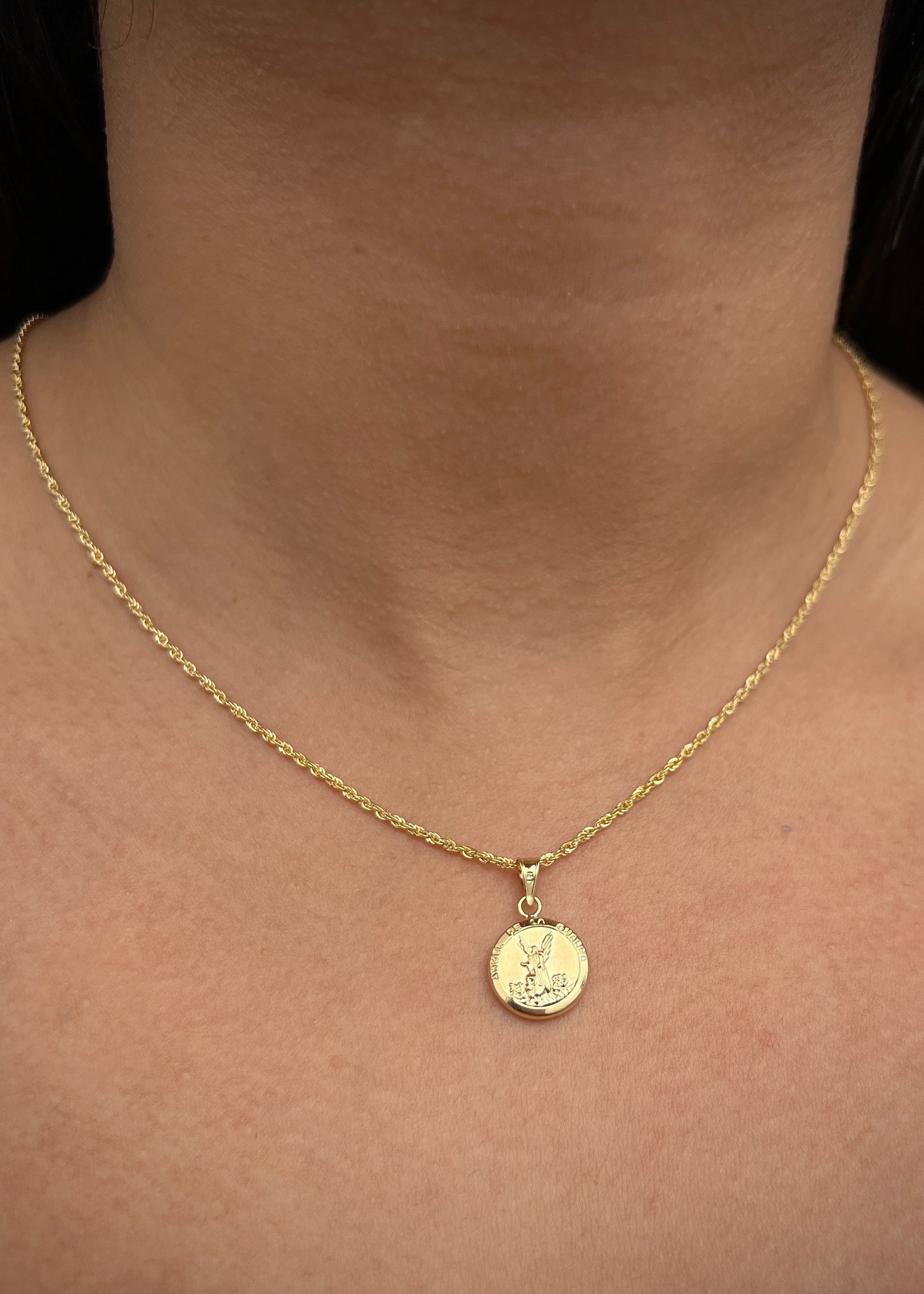 Dije angel de la guarda 0.7gr / Largo 1.9cm / Oro Amarillo Nac P