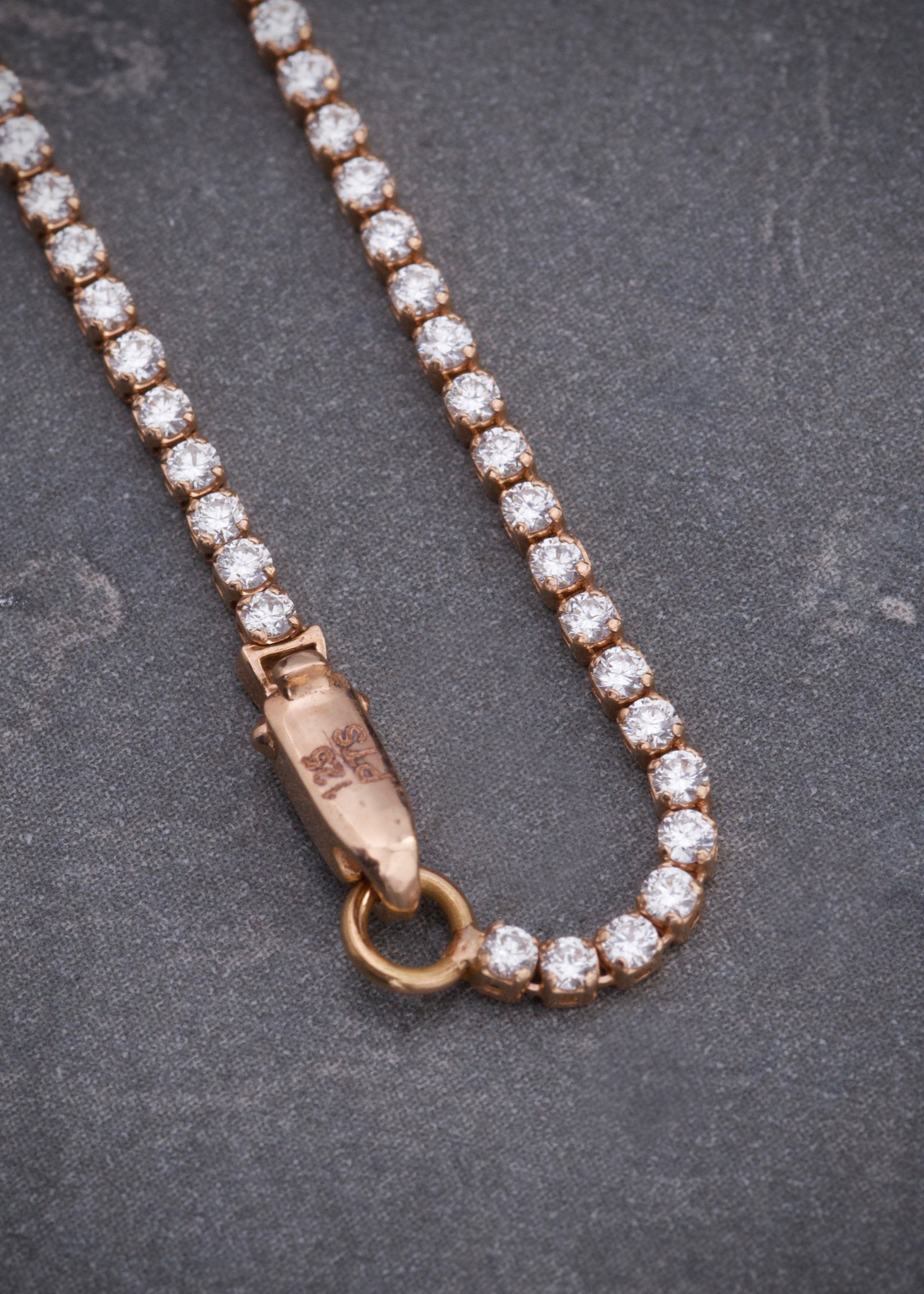 Pulso tenis con 125pts de diamantes 2.15gr / Largo 18cm / Oro Rosado (Joya) P