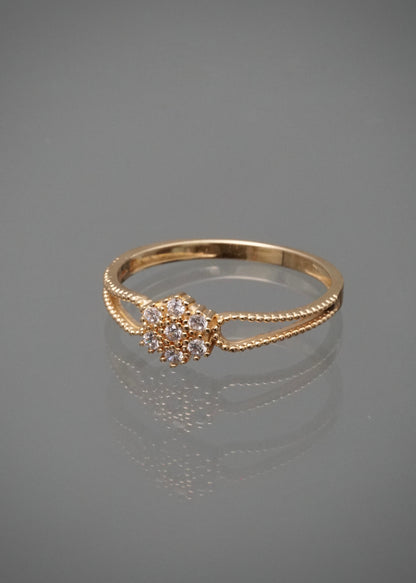Anillo flor con swarovski blanco 1.6gr / Talla 7 3/4 / Oro Amarillo Nac B