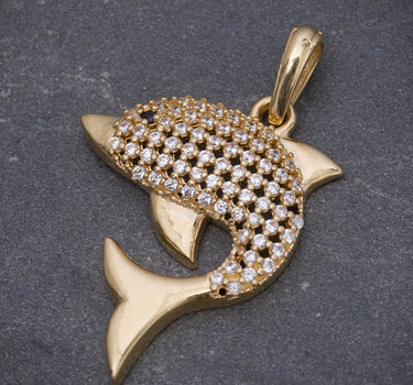 Dije delfin con swarovski negro y blanco 2.8gr / Largo 3.1cm / Oro Amarillo Nac P