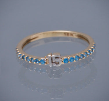 Anillo de 15s con swarovski azul 1.3gr / TALLA 5 3/4 / Oro Amarillo Nac*