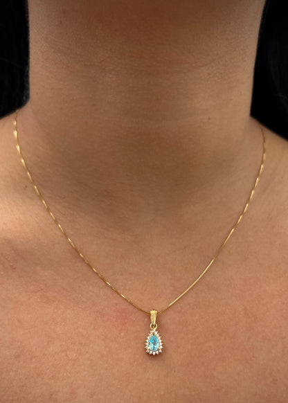 Dije gota con swarovski azul y blanco 1.1gr / Largo 1.7cm / Oro Amarillo Nac B