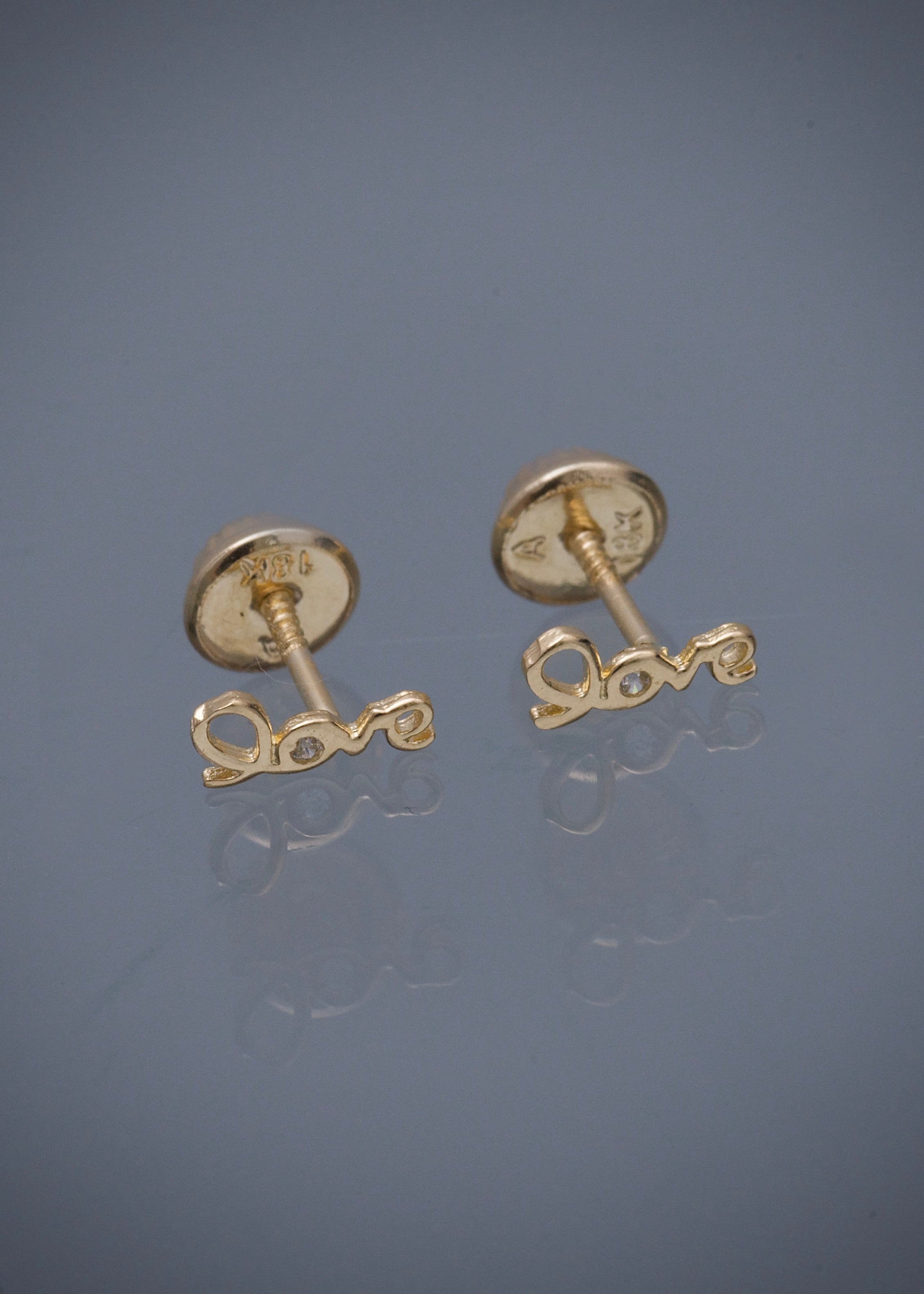 Topos love con swarovski blanco 0.55gr / Largo 0.34cm / Oro Amarillo Nac B