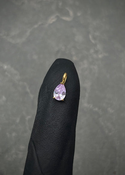 Dije con swarovski lila 0.4gr / Largo 0.9cm / Oro Amarillo Nac B