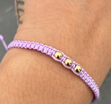 Pulsera en hilo morado con bolas lisas 4mm 0.25gr / Oro Amarillo (Joya) M