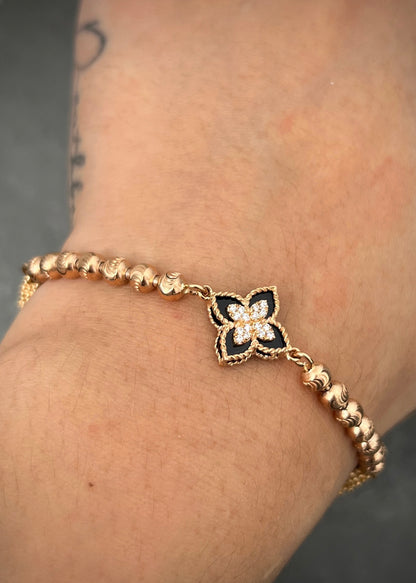 Pulso lucky clover piedra negra 12.4gr / Largo 19cm / Oro Rosado Nac B