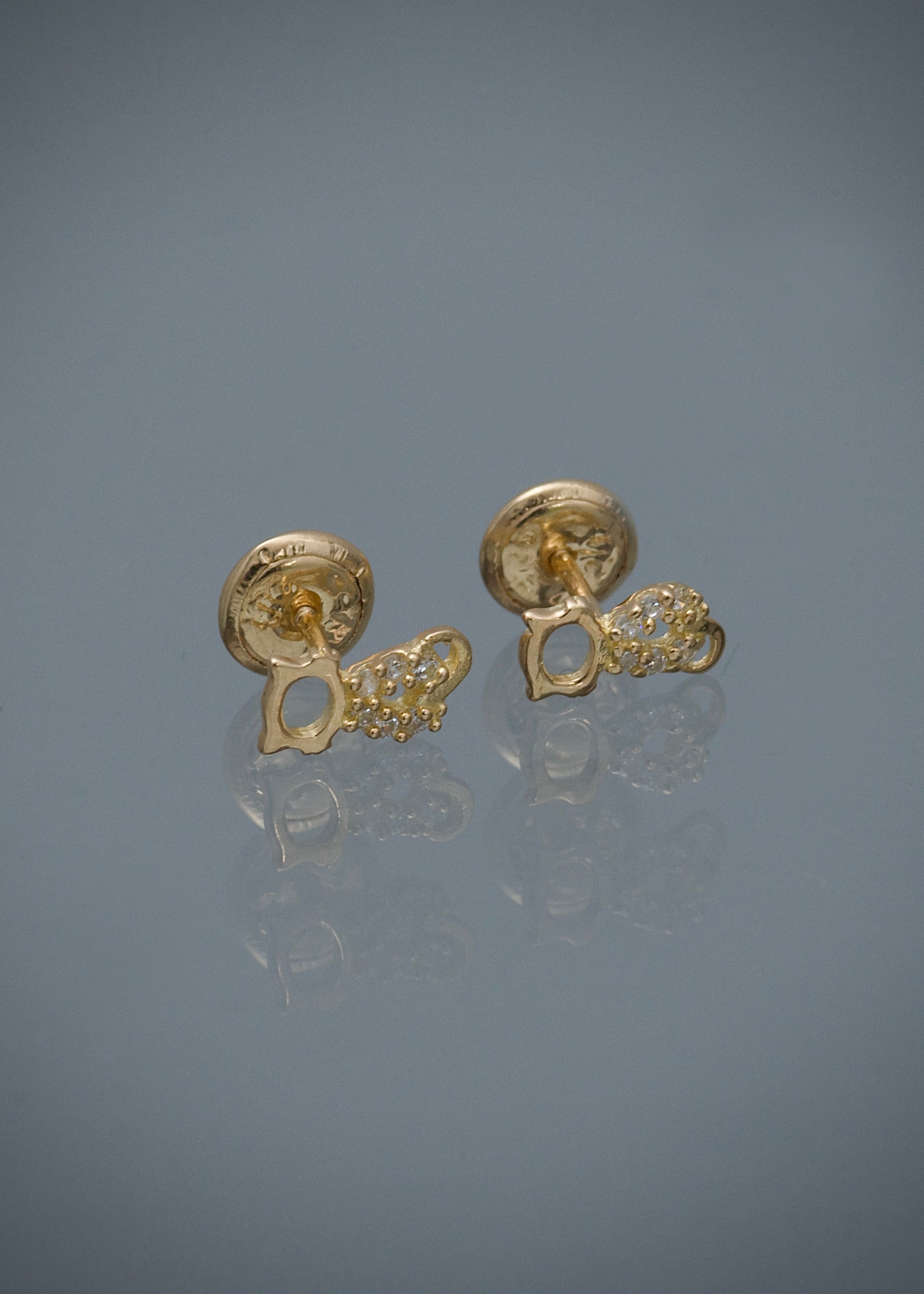 Topos gato con swarovski blanco 0.75gr / Largo 0.8cm / Oro Amarillo Nac M