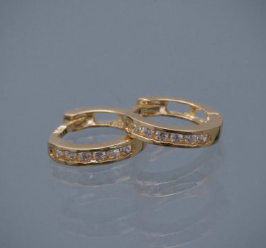 Candongas con swarovski blanco 1.25gr / Largo 0.9cm / Oro Amarillo Nac B