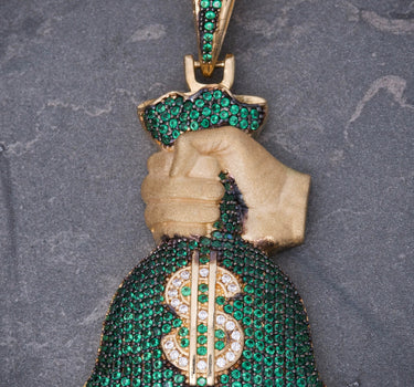 Dije bolsa de dinero con swarovski verde 15.75gr / Largo 5.5cm / Oro Amarillo Nac M