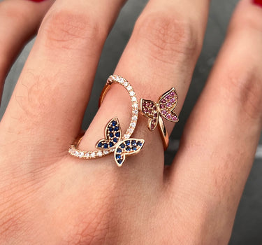 Anillo mariposas con swarovski 2.55gr / Talla 5 3/4 / Oro Rosado Nac B