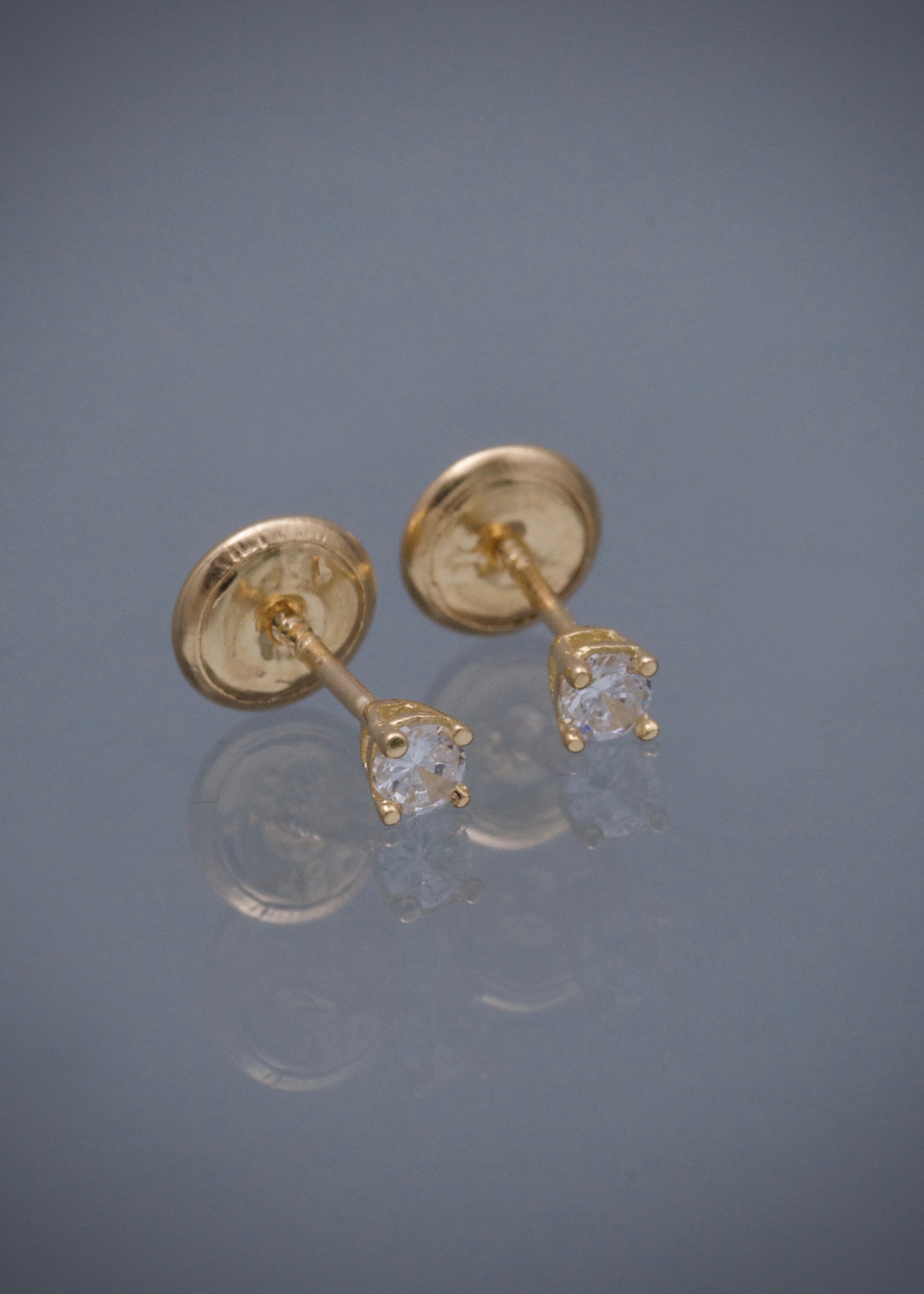 Topos con swarovski blanco 0.55gr / Largo 0.26cm / Oro Amarillo Nac*