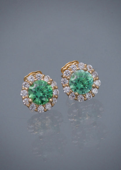 Topos flor con swarovski verde y blanco 3.2gr / Largo 0.9cm / Oro Amarillo Nac B