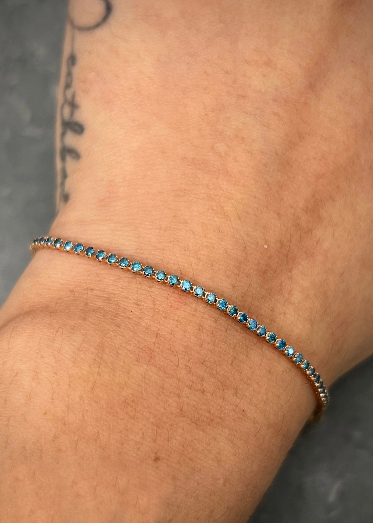 Pulso tenis con 132pts de diamantes azules 2gr / Largo 18cm / Oro Rosado (Joya) P