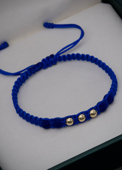 Pulsera en hilo azul con bolas lisas 4mm y Neoprenos 0.25gr / Oro Amarillo (Joya)*