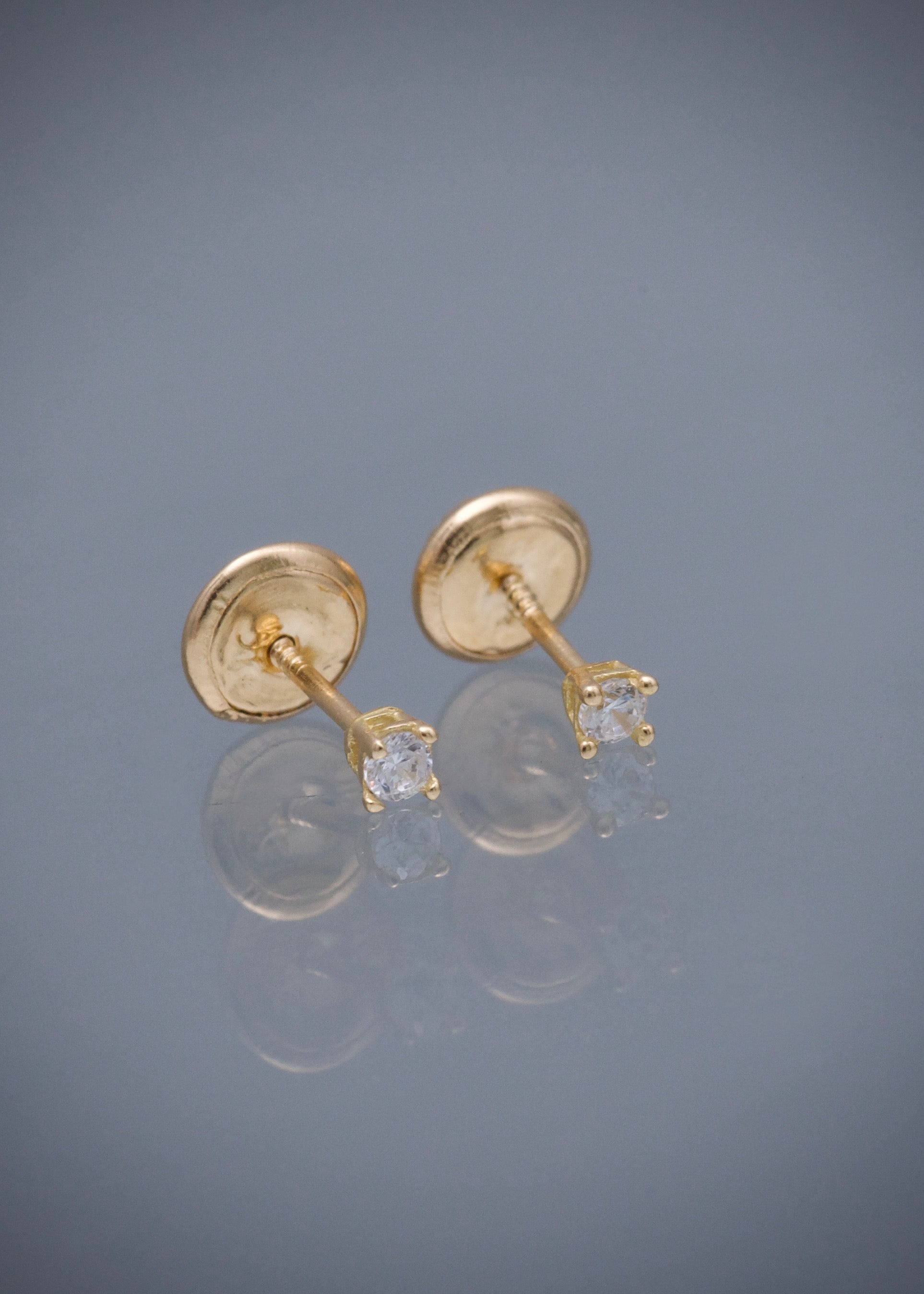 Topos con swarovski blanco 0.5gr / Largo 0.22cm / Oro Amarillo Nac B