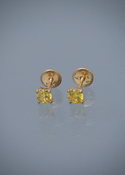 Topos con swarovski amarillo 0.9gr / Largo 0.4cm / Oro Amarillo Nac M