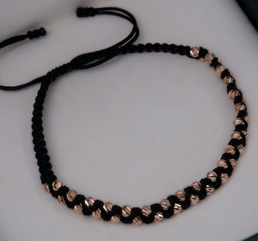 Pulsera en hilo negro con bolas diamantadas 2.15gr / Oro Rosado Nac (Joya) P