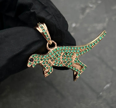 Dije DINOSAURIO CON SWAROVSKI VERDE 8.3gr / Largo: 2.6cm / Oro Rosado Nac M
