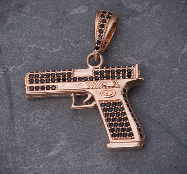 Dije pistola con swarovski negro 7gr / Largo 3cm / Oro Rosado Nac M