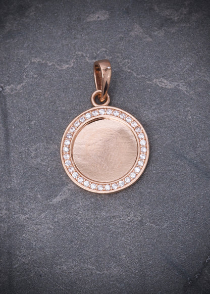 Dije medalla con swarovski blanco 2.35gr / Largo 2.3cm / Oro Rosado Nac M