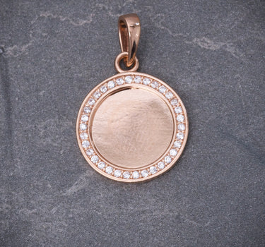 Dije medalla con swarovski blanco 2.35gr / Largo 2.3cm / Oro Rosado Nac M