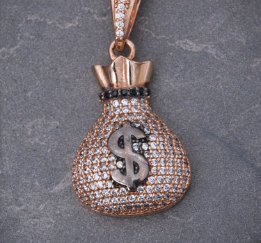 Dije bolsa de dinero con swarovski blanco 6.45gr / Largo 3.5cm / Oro Rosado Nac B