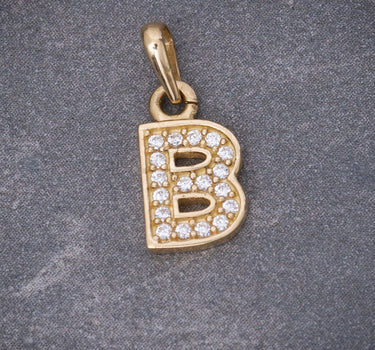 Dije letra B con swarovski blanco 0.9gr / Largo 1.5cm / Oro Amarillo Nac B