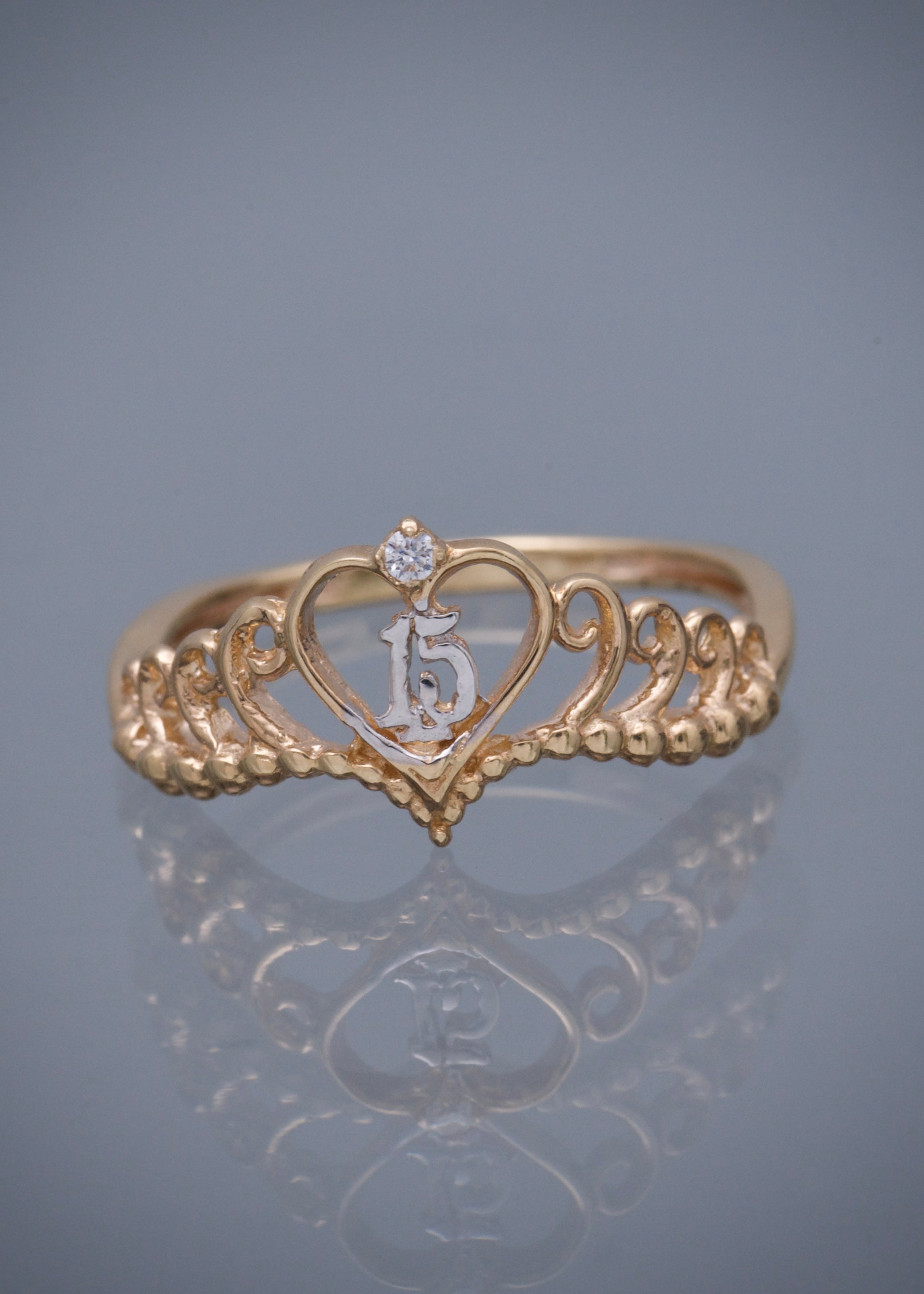 Anillo corona de 15s con swarovski blanco 2.05gr / TALLA 6 3/4 / Oro Amarillo Nac B