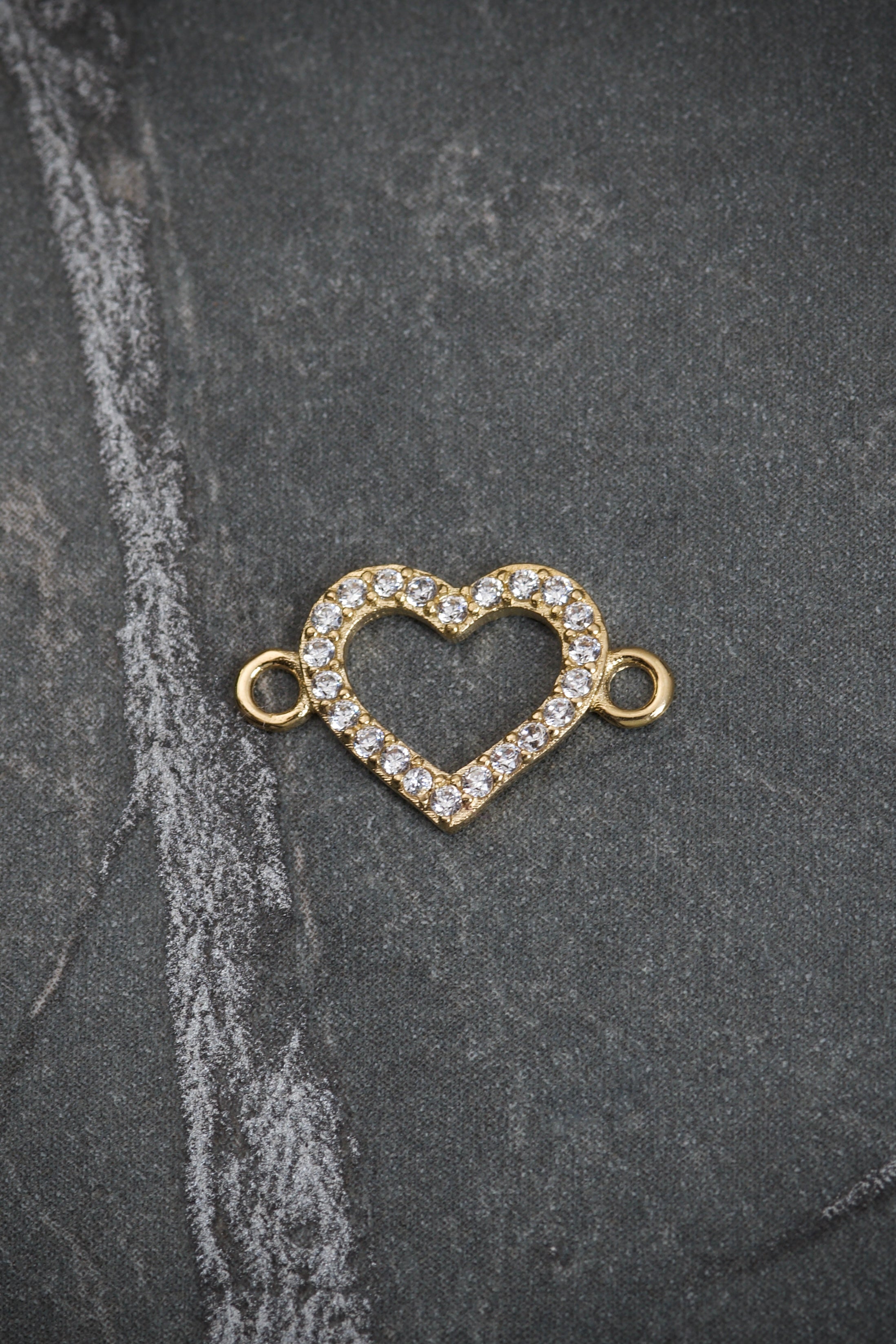 Herraje corazon con swarovski blanco 0.45gr / Largo 1.4cm / Oro Amarillo Nac B