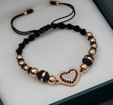 Pulsera de hilo negro con herraje de corazon con swarovski blanco y negro y bolas lisas 4gr / Oro Rosado (Joya) M