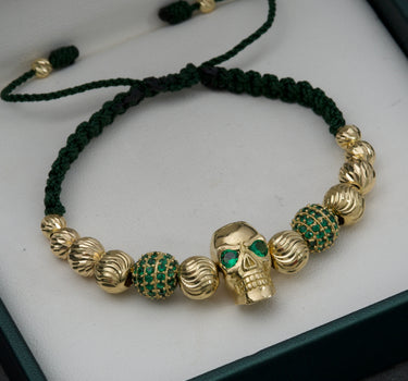 Pulsera de hilo verde militar con herraje de calavera. bolas de fuego y bolas diamantadas 16gr / Oro Amarillo (Joya) M