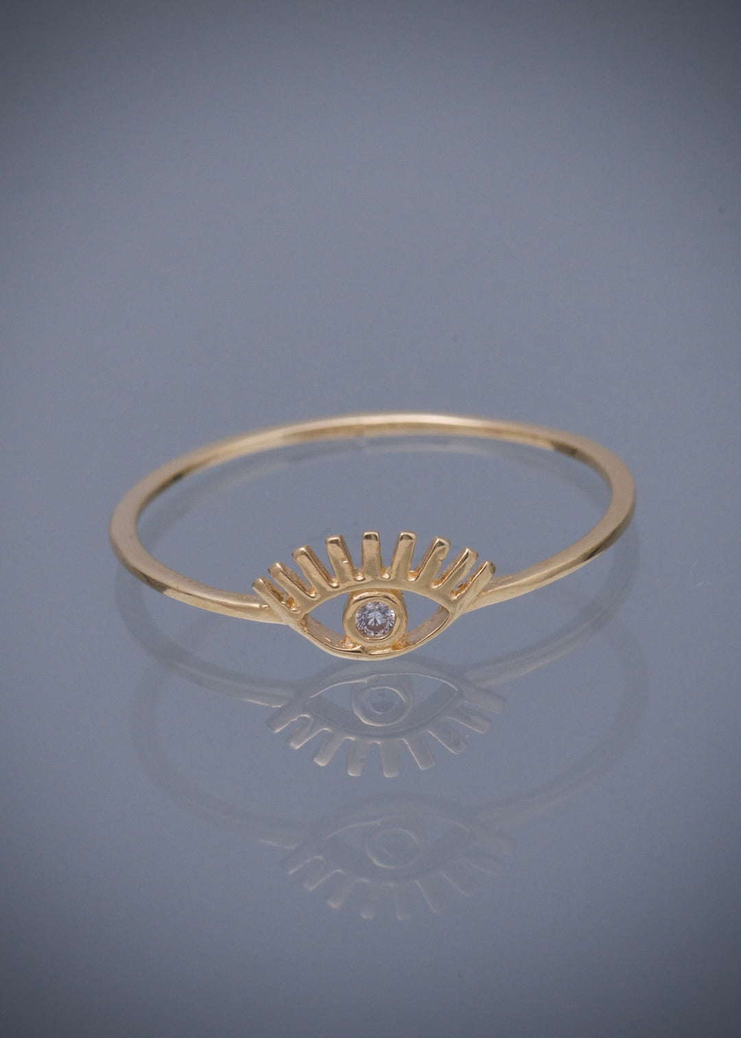 Anillo ojo con swarovski blanco 0.7gr / Talla 7 1/2 — Oro Amarillo