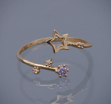 Anillo estrella con swarovski morado y blanco 1.3gr / TALLA 7 3/4 / Oro Amarillo Nac B