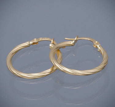 Candongas entorchadas 1.4gr / Largo 2.3cm / Oro Amarillo Nac M