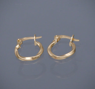 Candongas semi entorchadas 0.7gr / Largo: 1.3cm / Oro Amarillo Nac B