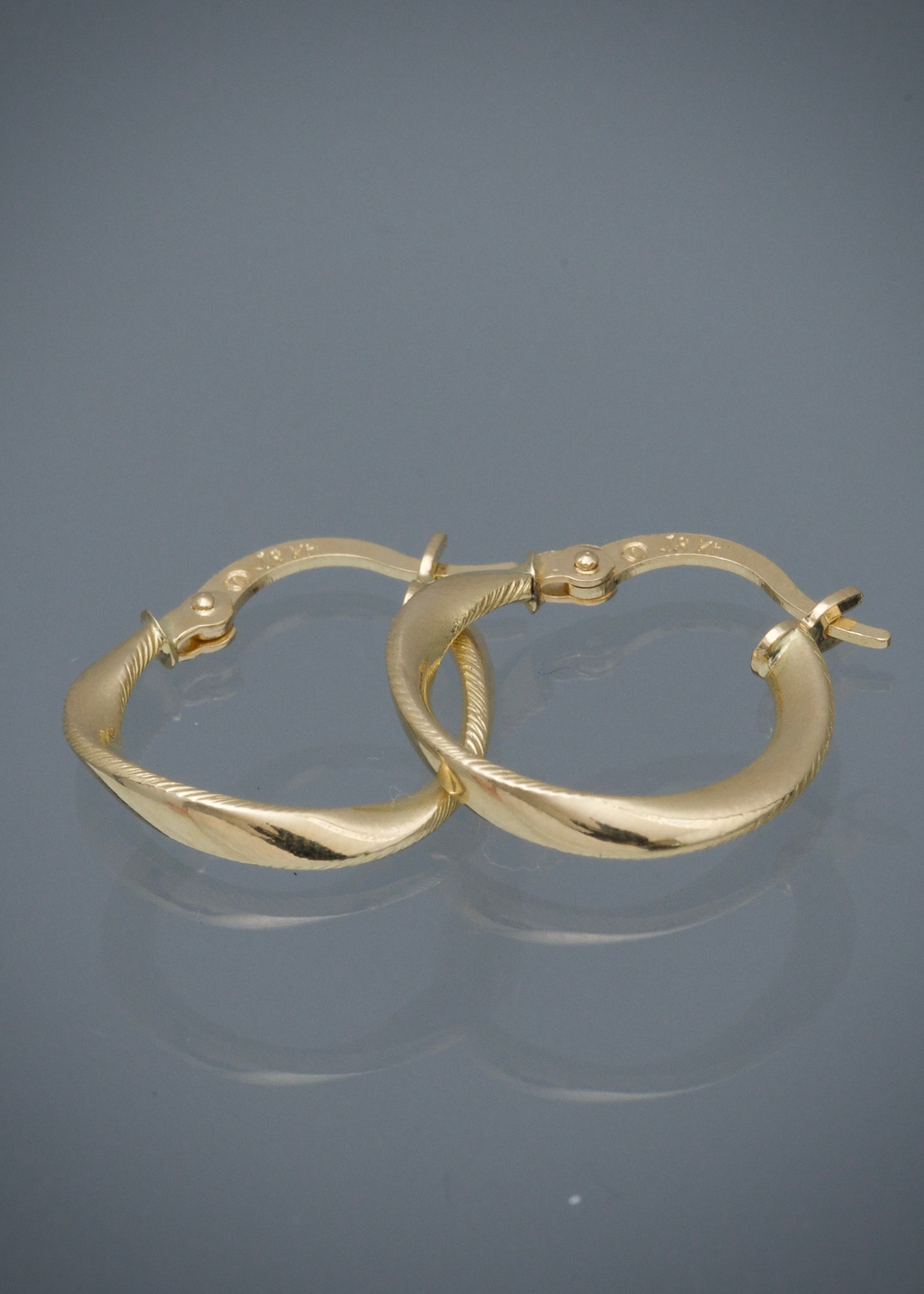 Candongas Semi entorchadas 1.15gr / Largo 1.7cm / Oro Amarillo Nac*