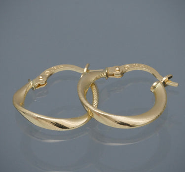 Candongas Semi entorchadas 1.15gr / Largo 1.7cm / Oro Amarillo Nac*