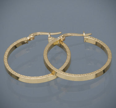 Candongas lisas con grabado 1.85gr / Largo 2.8cm / Oro Amarillo Nac M