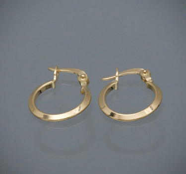 Candongas lisas 0.85gr / Largo 1.5cm / Oro Amarillo Nac M