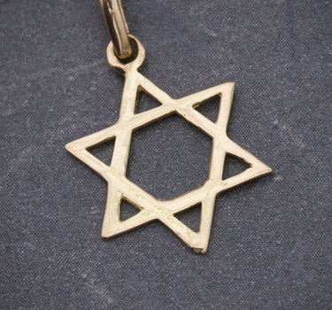 Dije estrella de david 0.6gr / Largo 2.2cm / Oro Amarillo Nac B