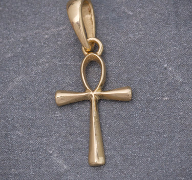 Dije De Cruz egipcia 0.5gr / Largo 2cm / Oro Amarillo Nac B