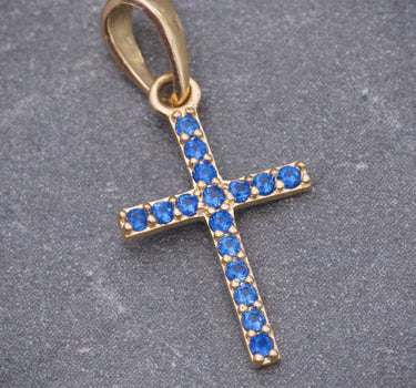 Dije cruz con swarovski azul 0.6gr / Largo 2.1cm / Oro Amarillo Nac B