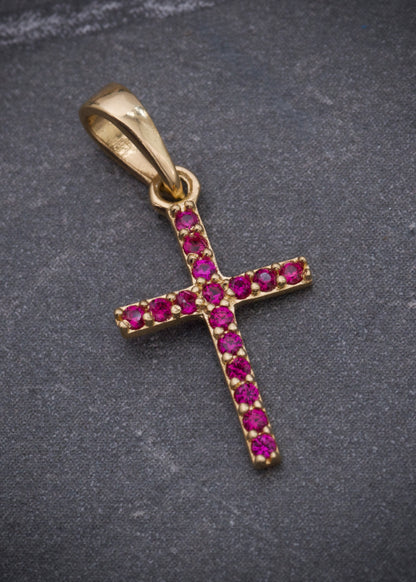 Dije cruz con swarovski fucsia 0.6gr / Largo 2.1cm / Oro Amarillo Nac B