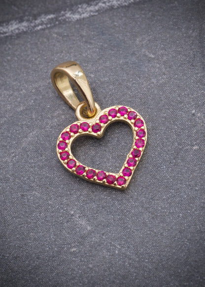 Dije corazon con swarovski fucsia 0.6gr / Largo 1.5cm / Oro Amarillo Nac B