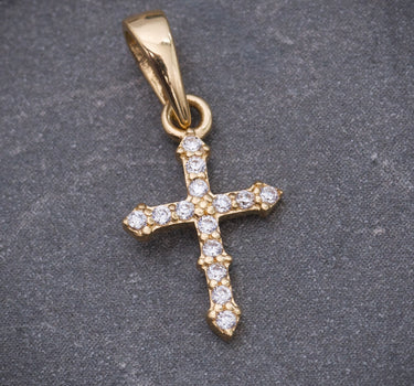 Dije cruz con swarovski blanco 0.5gr / Largo 1.8cm / Oro Amarillo Nac B
