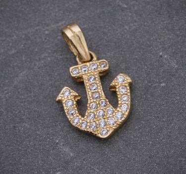 Dije ancla con swarovski blanco 0.85gr / Largo 1.5cm / Oro Amarillo Nac B
